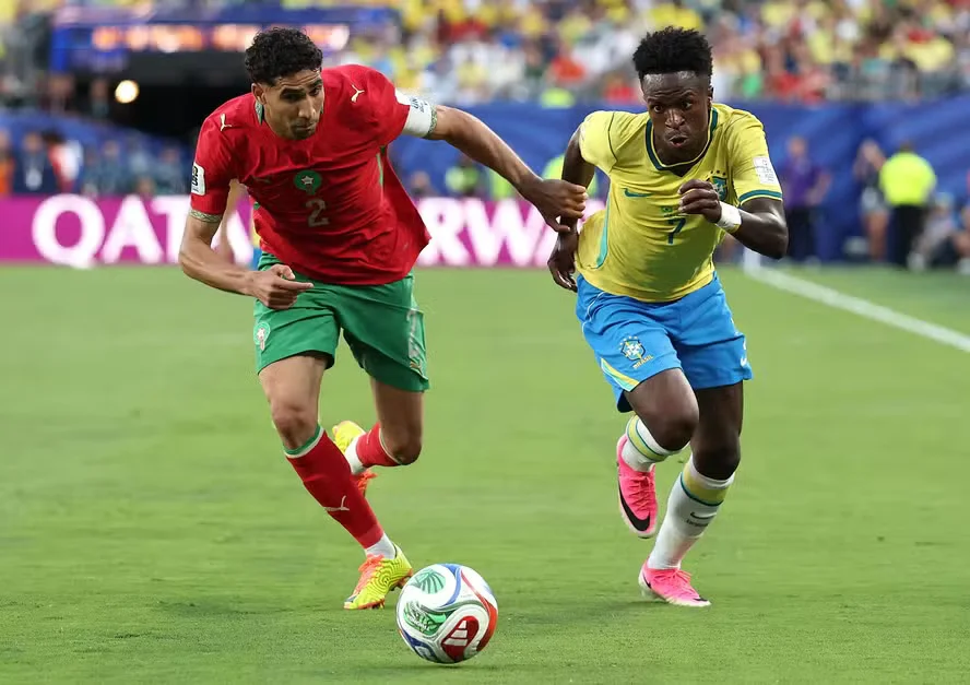 115259403-east-rutherford-new-jersey-june-13-achraf-hakimi-2-of-morocco-competes-for-the-ball